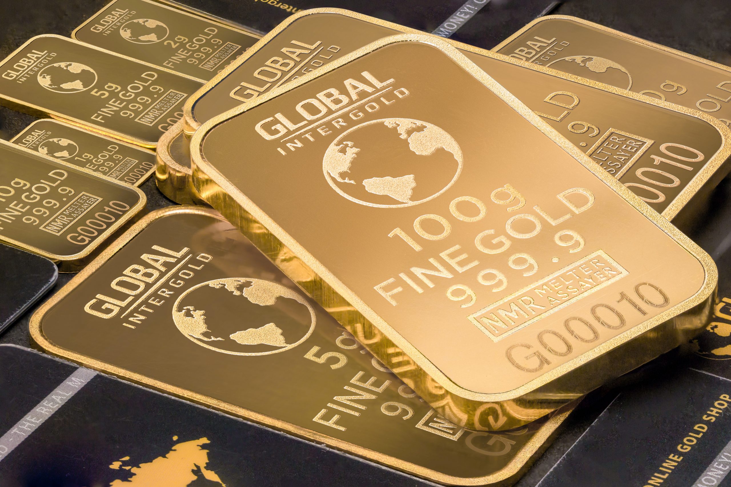 Gold eases from record highs on Tuesday
